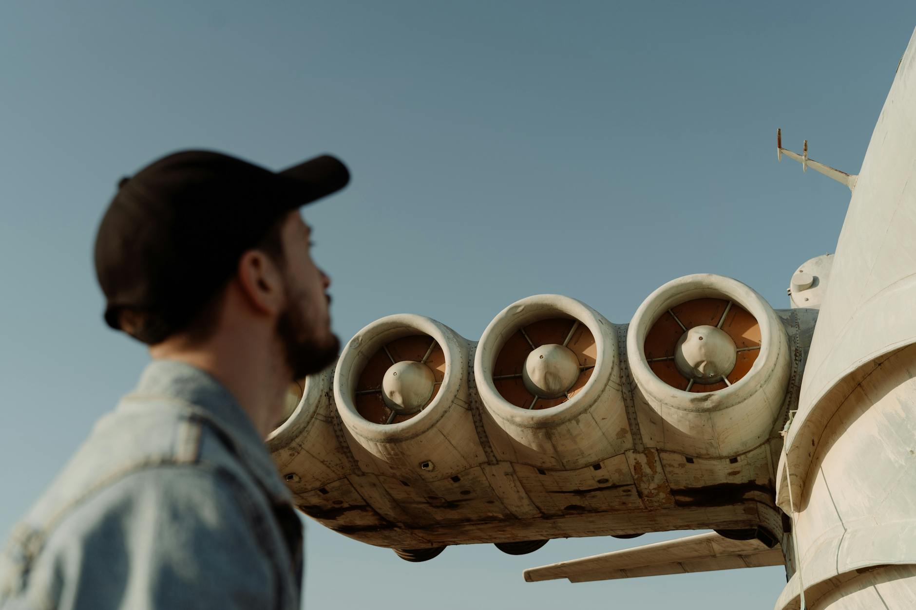 a man standing near an aircraft