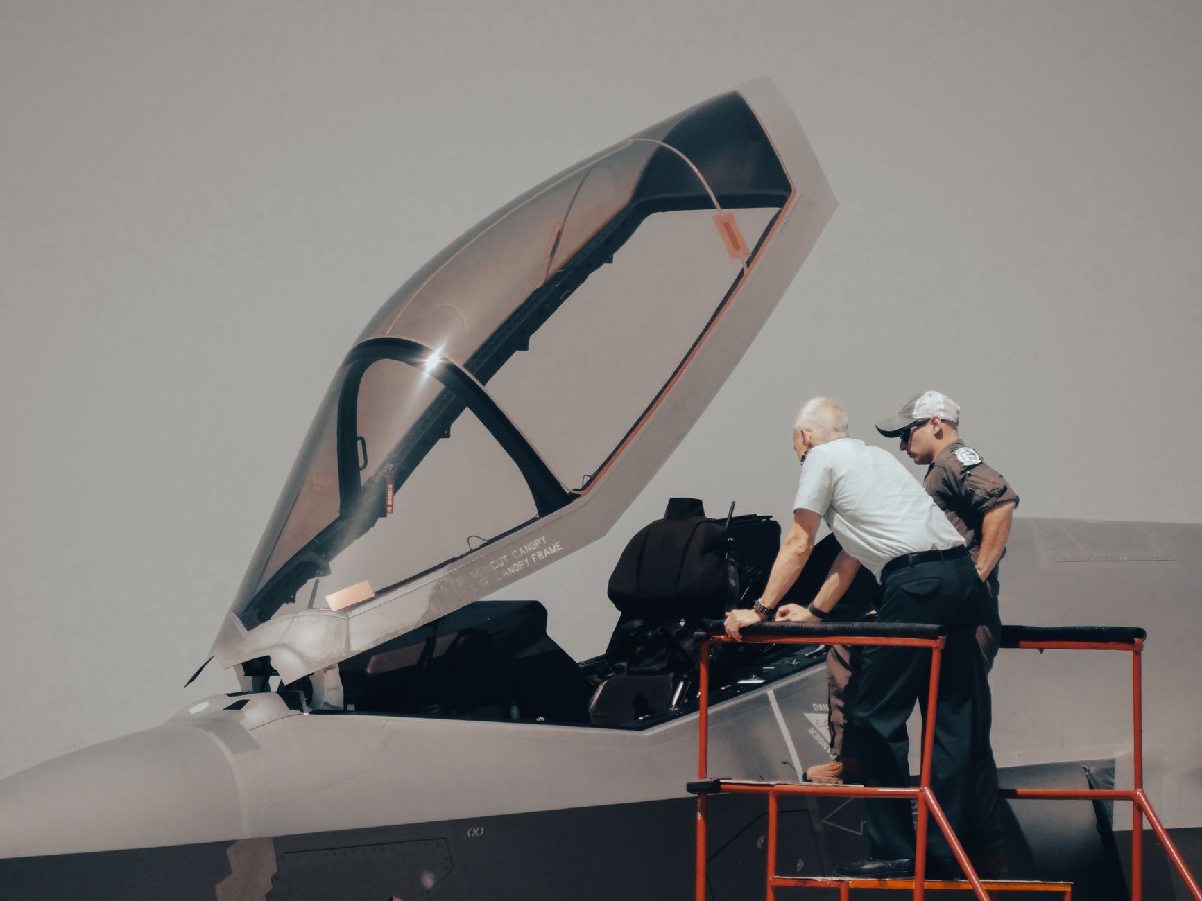 military aircraft inspection scene with crew