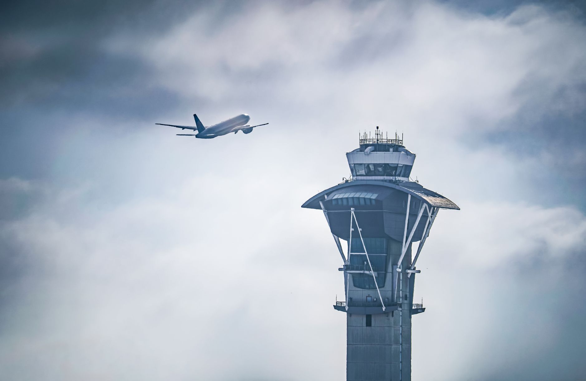 airplane taking off near lax control tower