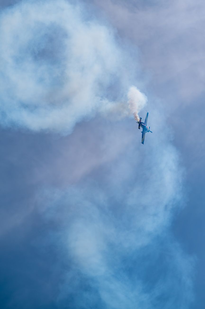 aerobatic stunt plane performing in sky